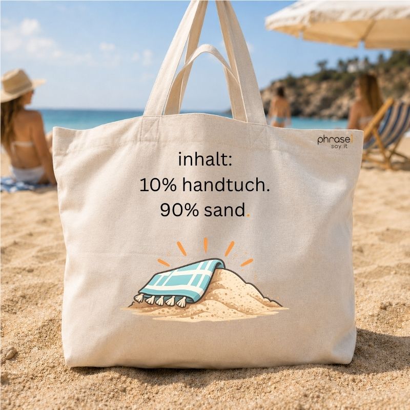 Premium Shopper mit Spruch „inhalt: 10% handtuch. 90% sand."